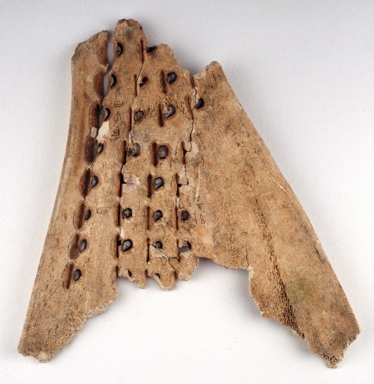 Piece wood containing inscriptions in ancient Chinese languages