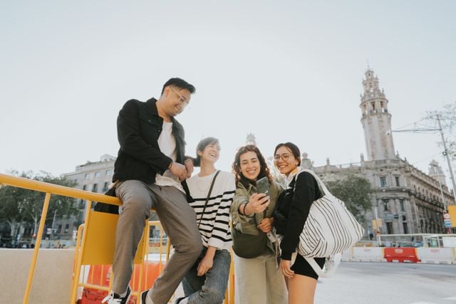 A group of friends hanging out in Madrid.